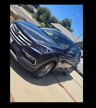 Customer Hyundai Santa Fe after a full Anselmo mobile detail in Riverside